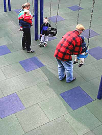 Rubber tile sythetic playground surfacing.