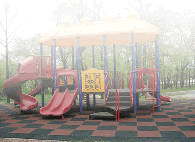 Synthetic rubber tile playground surfacing.